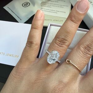 Oval Cut Solitaire Ring with packaging